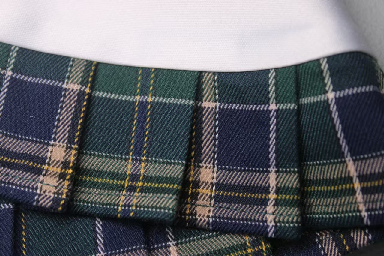 Close-up view of the 'Emma' preppy pet bandana with a white collar, showcasing a private school-inspired design for sophisticated pet fashion.